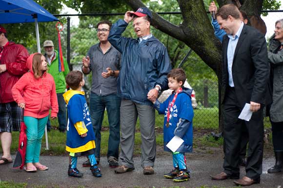 Brian Kearns with grandsons Cameron and William and happy onlookers. Photo by Kate Settle.