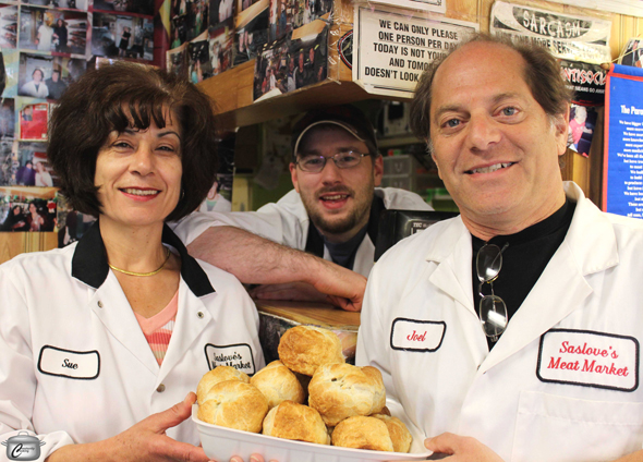 Sue Saikaley, Connor Wells and Joel Diener with knishes. Photo by Paula Roy.