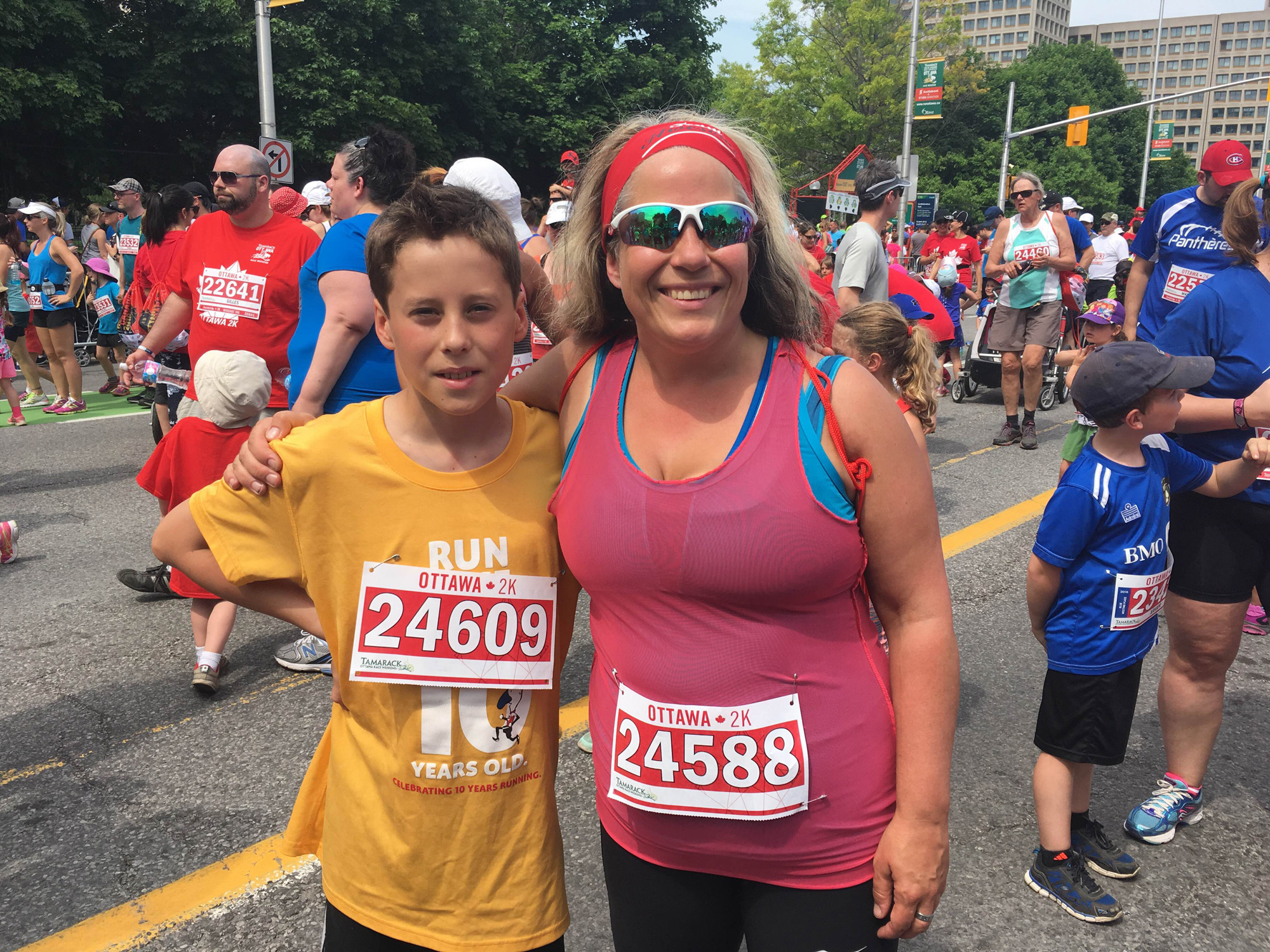 Lisa Georges is the race director for the Cyclelogik Hintonburg Centennial 5K Run/Walk & Newswest 1K Kids’ Run, which is taking place July 10. She’s pictured here with her son Evan.