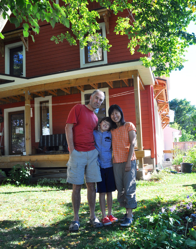 Malcolm Edwards, Melinda Tan and their son Saer live in this energy efficient home in Westboro. Photo by Andrea Tomkins