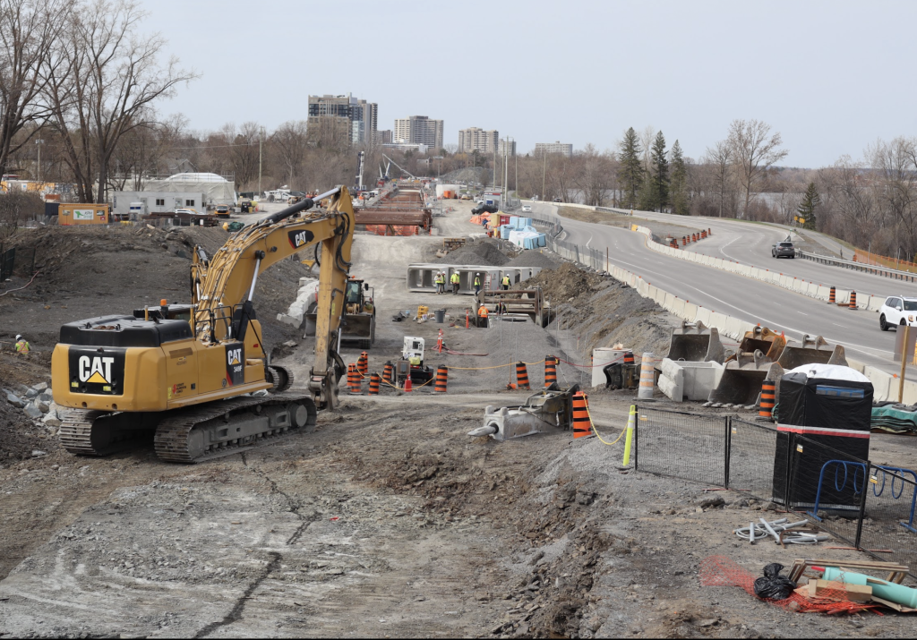 LRT construction in Westboro. Machinery works along the parkway.