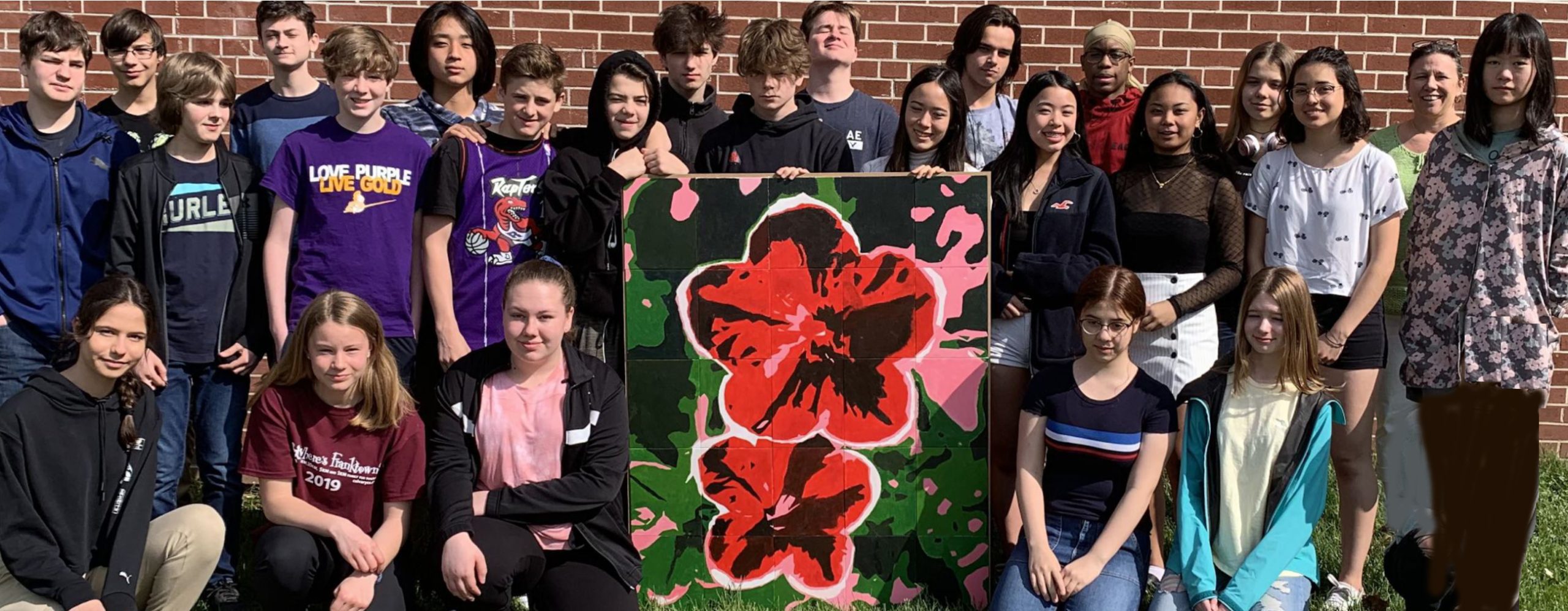 The students of Nepean High School donated this painting, Complementary Flowers, to the Cornerstone Housing for Women. 