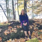 Meghan Maack, who works with Cuso, takes a break from an autumn hike in Ottawa.