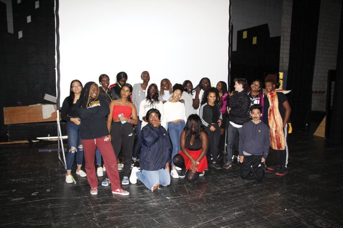 19 students pose for a photo during the Haunted House at Notre Dame High School.. Mr. Cuffaro photo