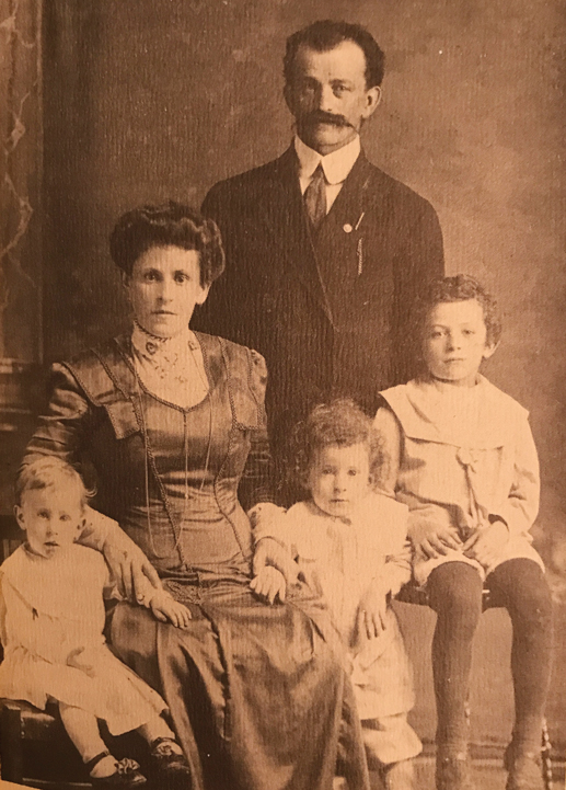 A sepia tone photo of the Lieff family is seen in 1910|A scanned article from the Ottawa Journal from November 24