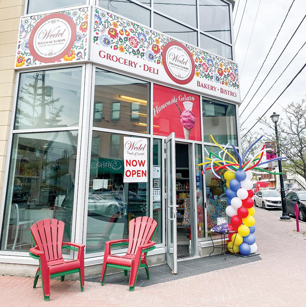 Wedel - Touch of Europe is seen on its opening day with ballons and red deck chairs out front