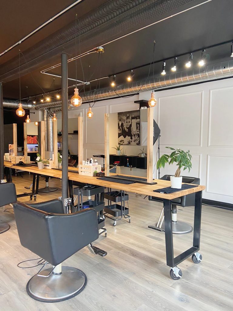 A photo of the interior of the Shampoo Hair Salon.