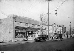 Loblaws, Victoria Theatre and Higmans on Wellington (now St Vincents, apt building and Thyme & Again) (Library Archives Canada, C-080423)