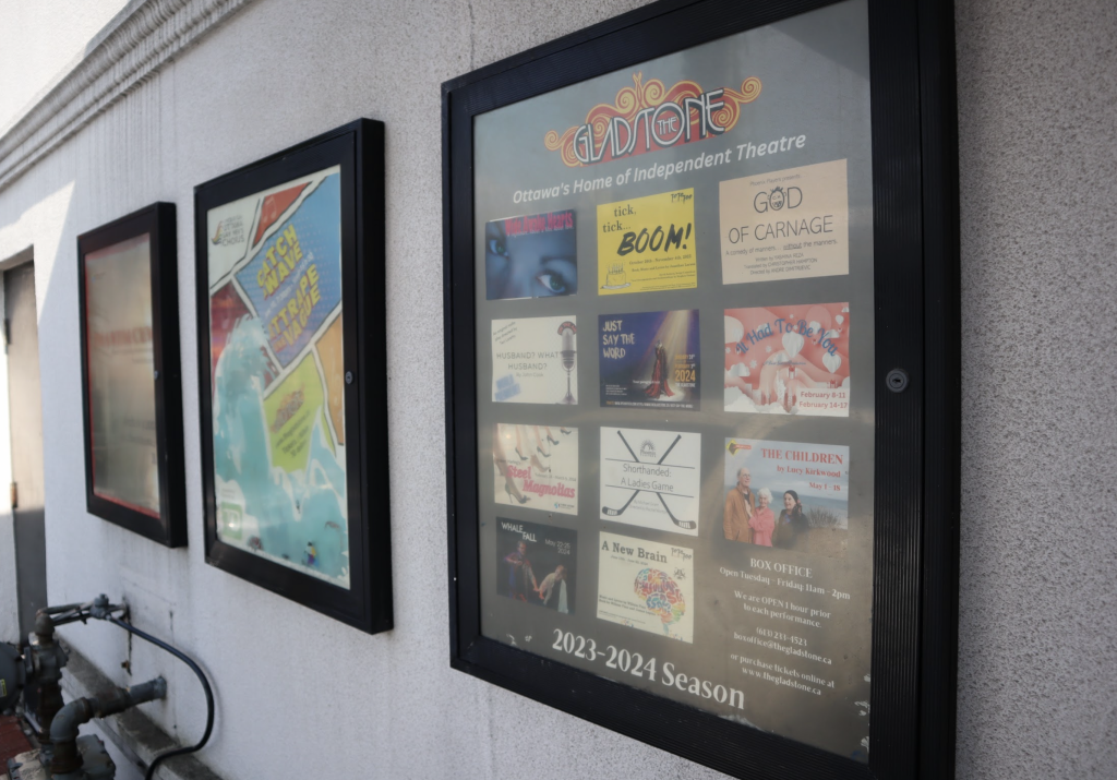 Posters for upcoming shows are on display outside of the Gladstone. 