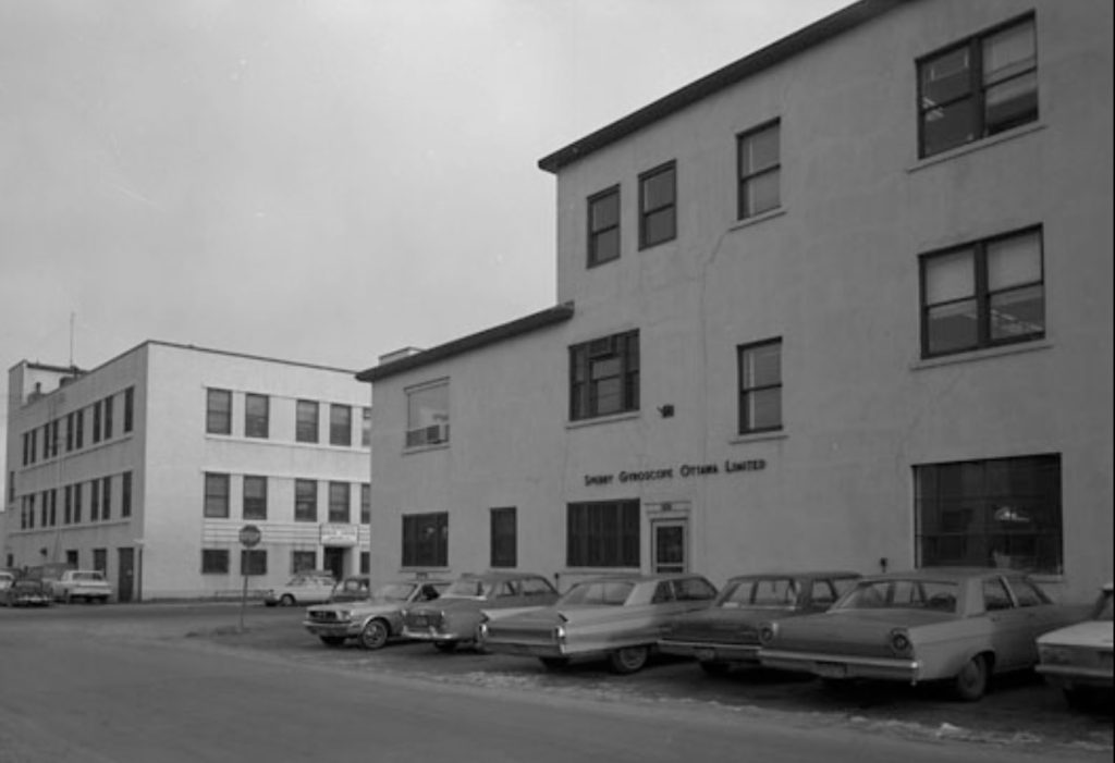 A black and white photo of a building. 