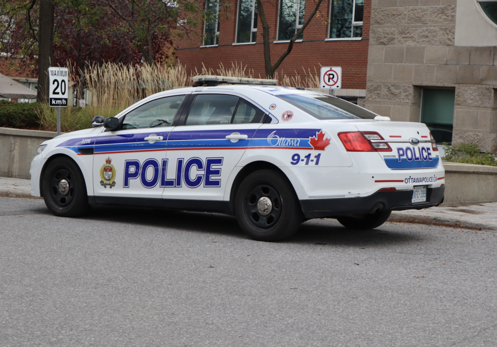 A police car sits outside the Jewish centre. 