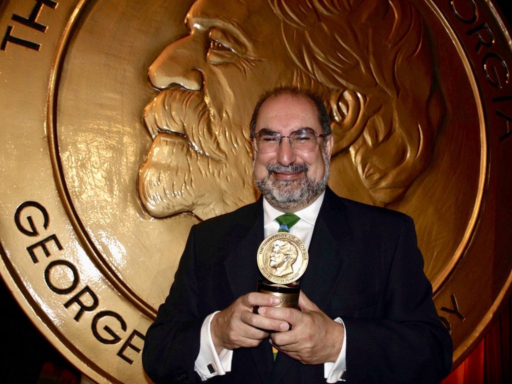 Firdaus Kharas holds up his Peabody.  