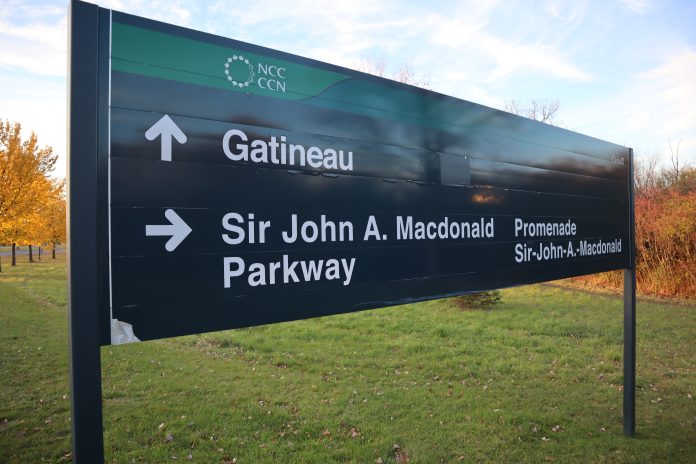 A sign at the beginning of the Sir John. A MacDonald Parkway