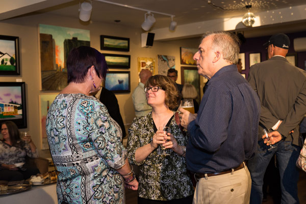 Karen Secord chatting with partygoers.