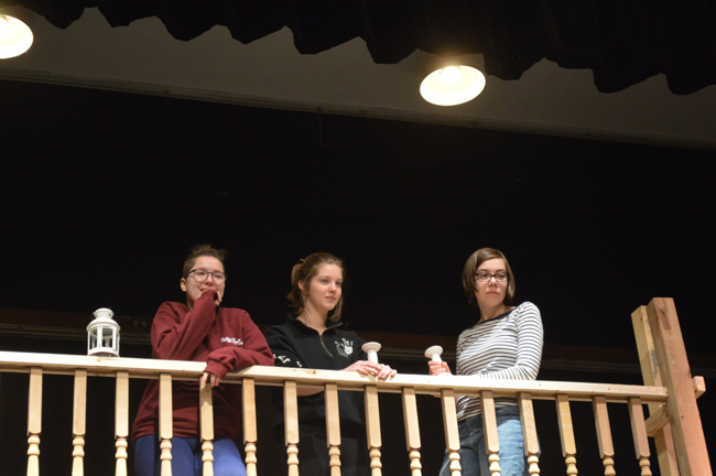 Nepean High School students Megan Clark, Tess Martin, and Clara Austrins during rehearsals for The Addams Family musical.