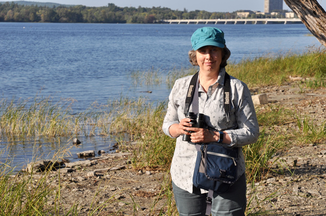 Kitchissippi’s Bev McBride leads birding excursions for the Ottawa Field-Naturalists Club. She’s pictured here on the shores of the Ottawa River, which is part of an internationally designated Important Bird and Biodiversity Area (IBA). Photo by Andrea Tomkins