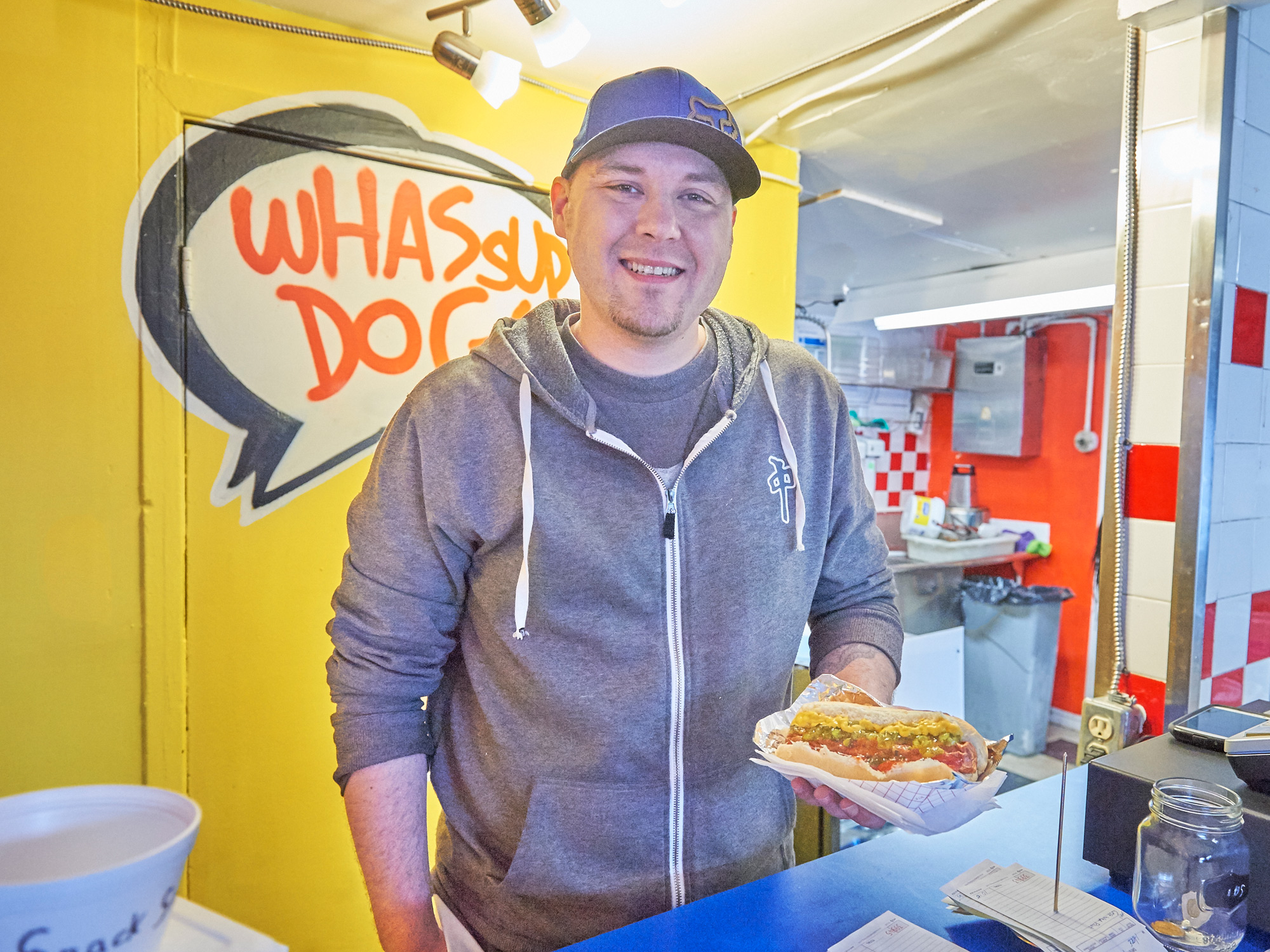 One of the newest additions to Kitchissippi is Wassup Dog, which has taken over the shack that used to be home to SuzyQ before they moved down the block. Jeff Hynes is the manager. Photo by Ellen Bond