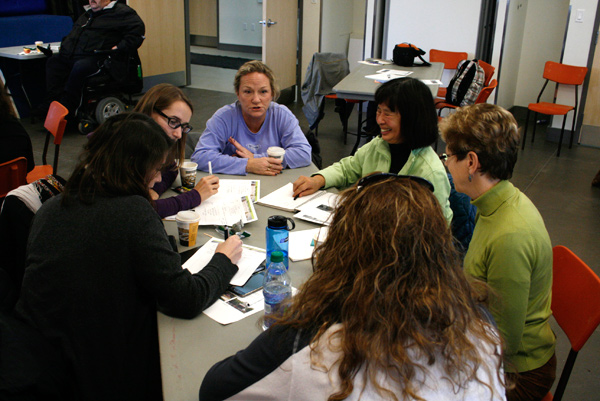 Mechanicsville resident Lorrie Marlow discusses ideas on improving the ward’s parks with other members of her group.