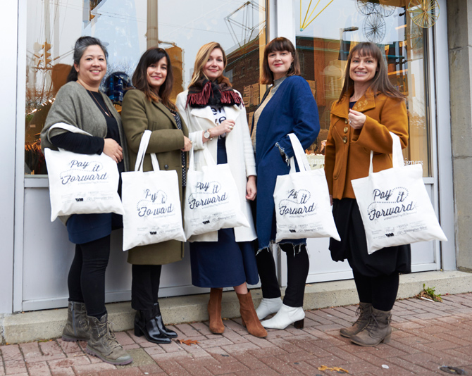 Kitchissippi shoppers are encouraged to give back to the community with a “Pay it Forward” campaign. Grab a tote bag, fill it for women in need, and drop it off at a participating retailer in exchange for a special gift.  Photo by Ellen Bond