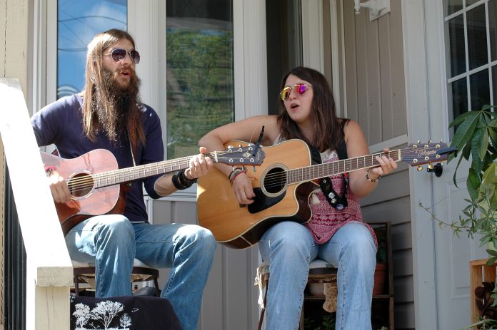 A photo of the Jimmy Tri-Tone Band performing in the 2017 Porchfest.|