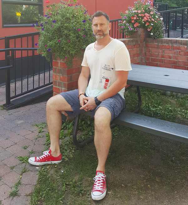 Jeff Frost of the Wellington Diner, pictured on a patio that isn’t a patio. Photo by Alyson Queen