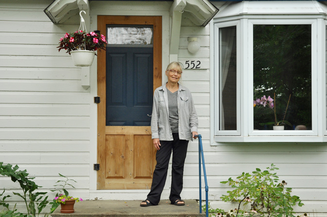 Anne Hamilton lives on Edison at Princeton in the small house with the white picket fence. Photo by Andrea Tomkins