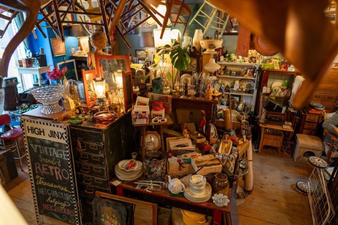 A bunch of furniture in a store.